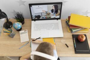 close-up-kid-learning-online